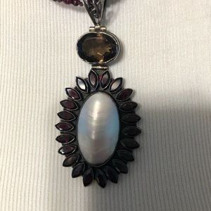 Fine garnet necklace with pendant